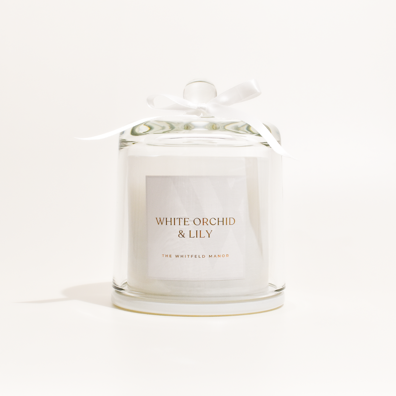 White orchid and lily candle