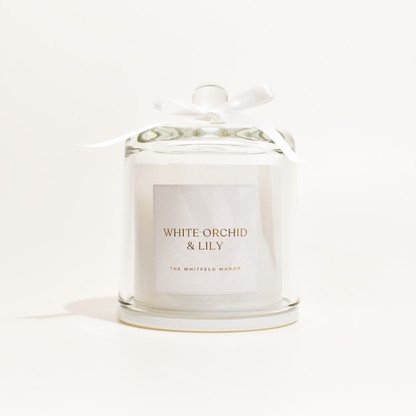 White orchid and lily candle