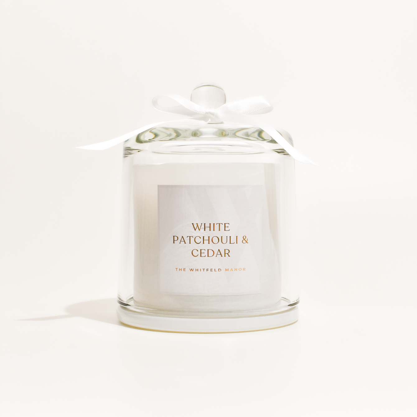 White patchouli and cedar (Black Opium*) candle